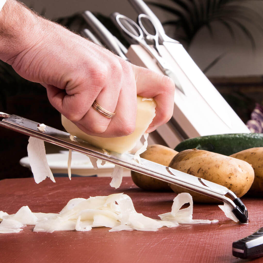 Râpe à lame en acier inoxydable 3Claveles avec manche en TPR et polypropylène