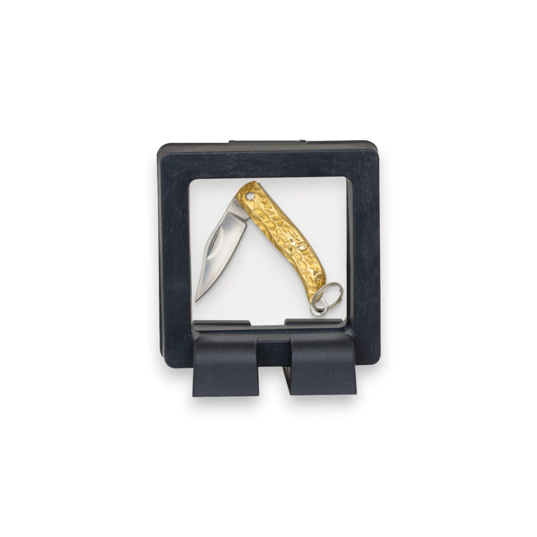 Couteau miniature Dije avec une lame pointue de 2,8 cm et un manche en laiton gaufré