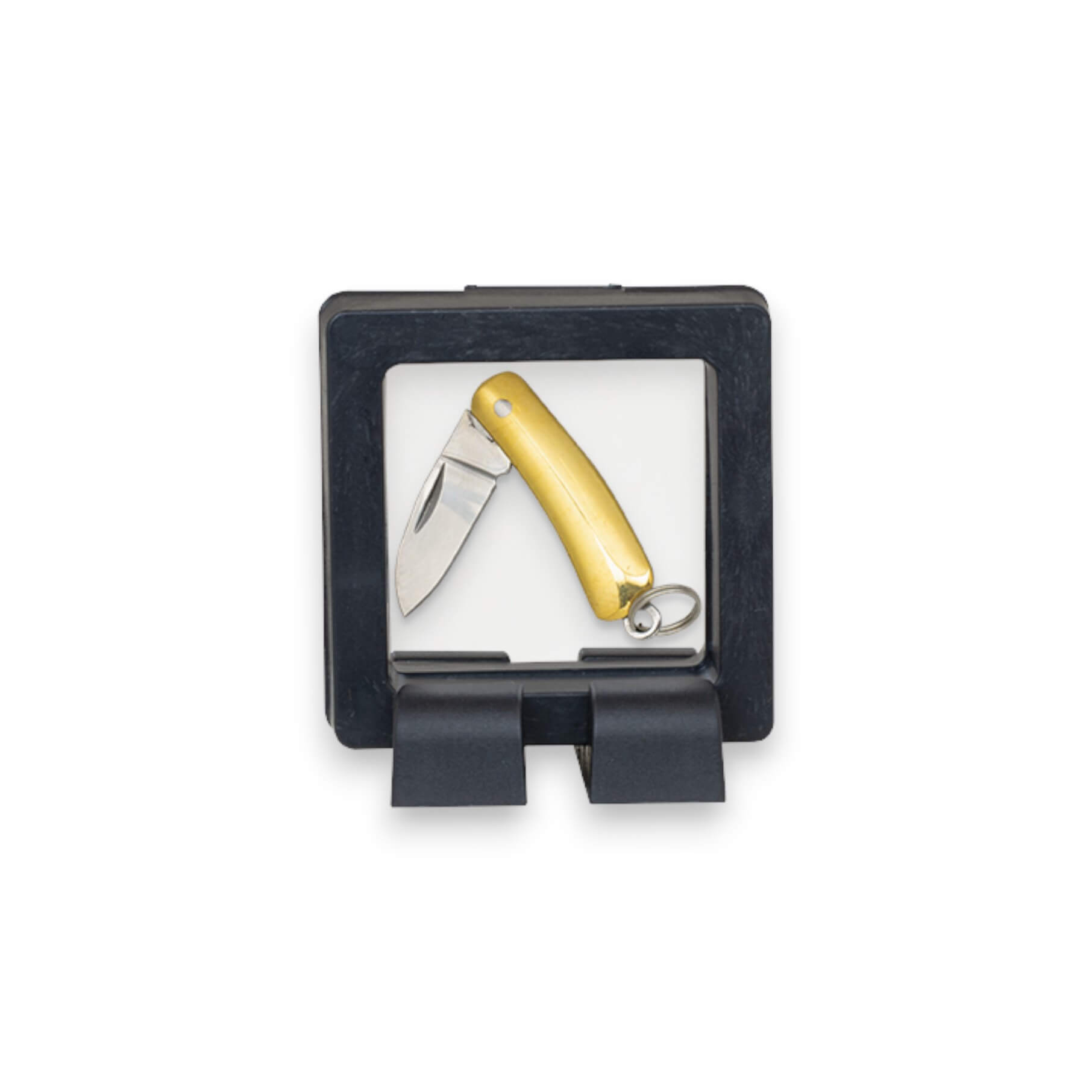 Couteau de poche miniature avec une lame de 2,5 cm et un manche en laiton