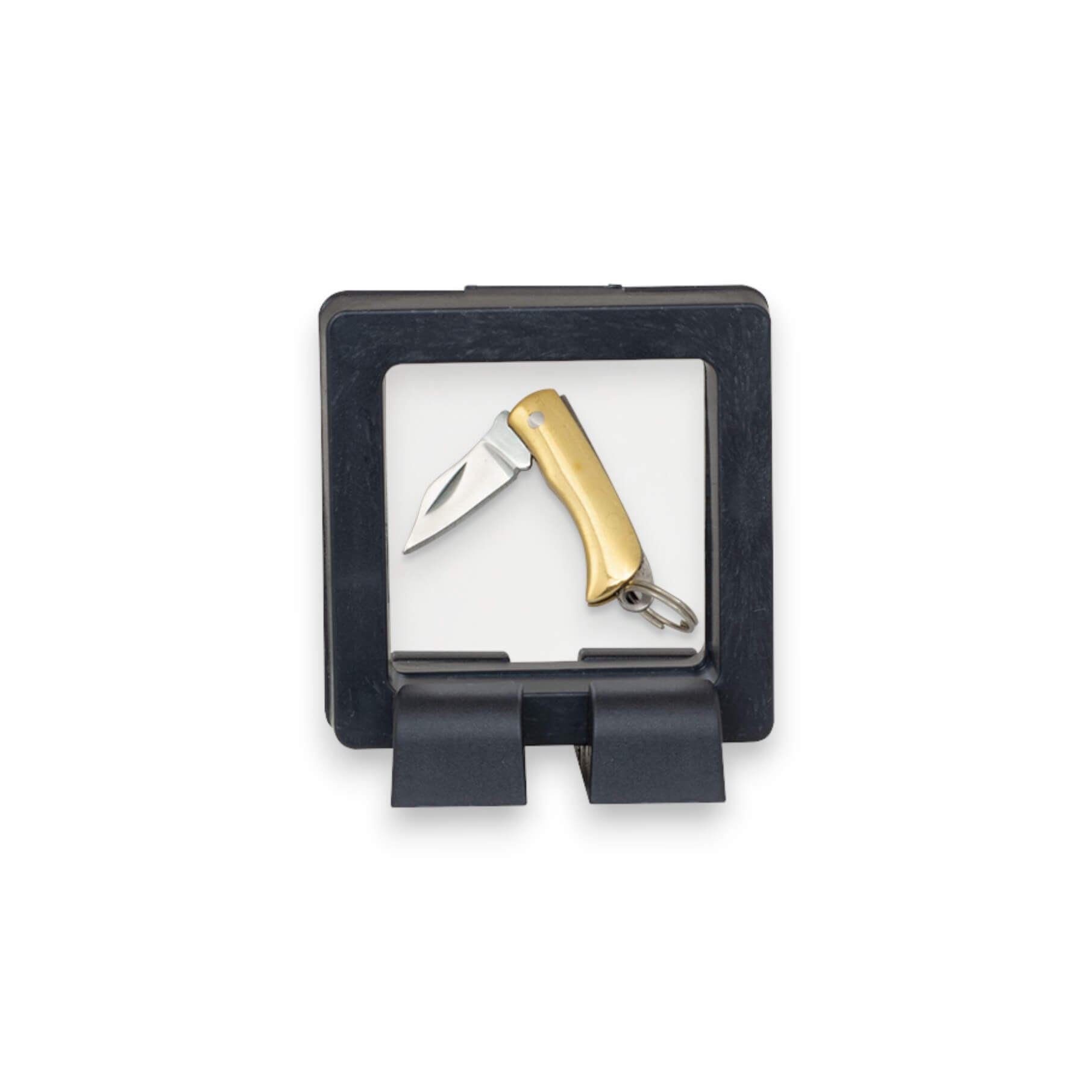 Couteau de poche miniature avec une lame de 1,9 cm et un manche en laiton