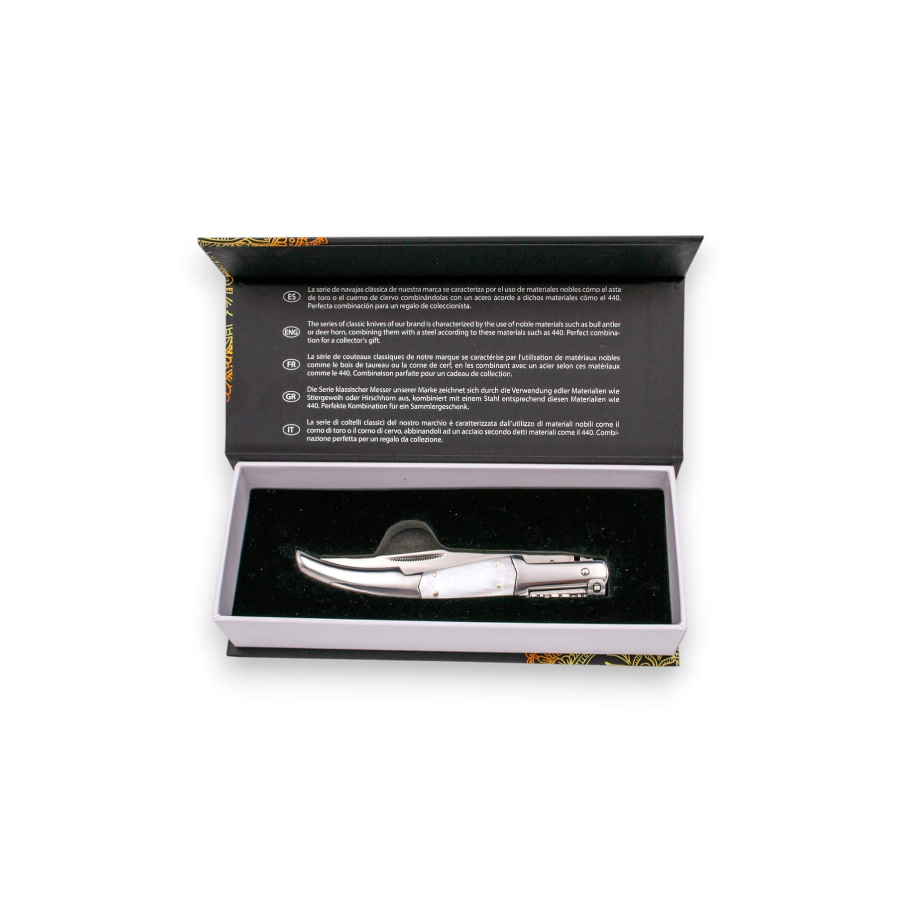 Ratschenmesser aus Perlseide mit Edelstahlgriff, spiegelpolierten Zwingen und weißen Acryl-Einsätzen sowie einer 11 cm langen Klinge