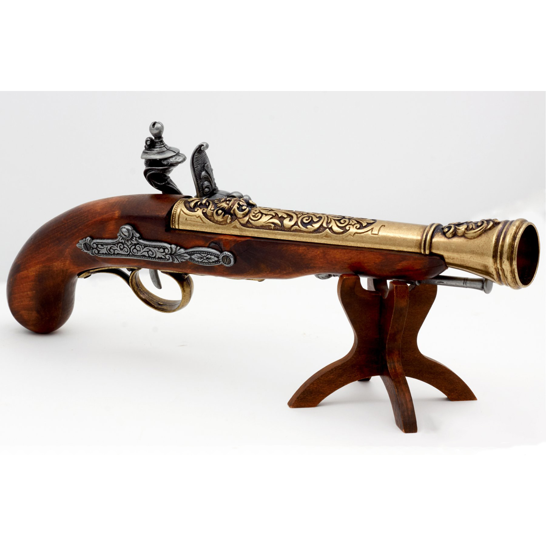 Left-handed pirate flintlock pistol made of wood and brass-finished metal, 18th century