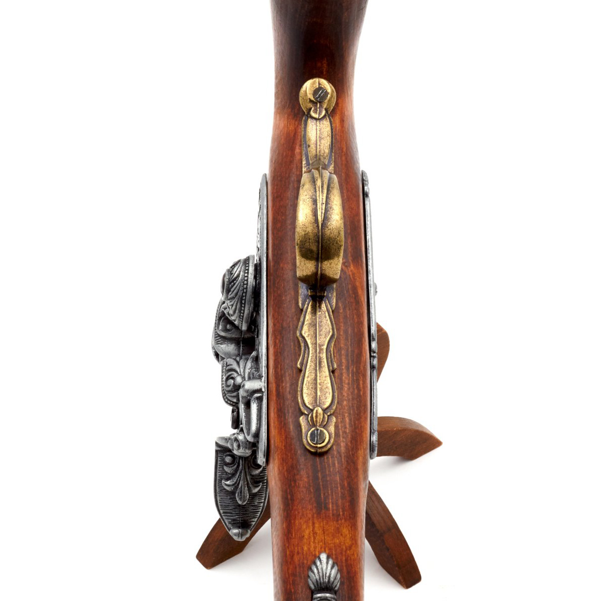 Left-handed pirate flintlock pistol made of wood and brass-finished metal, 18th century