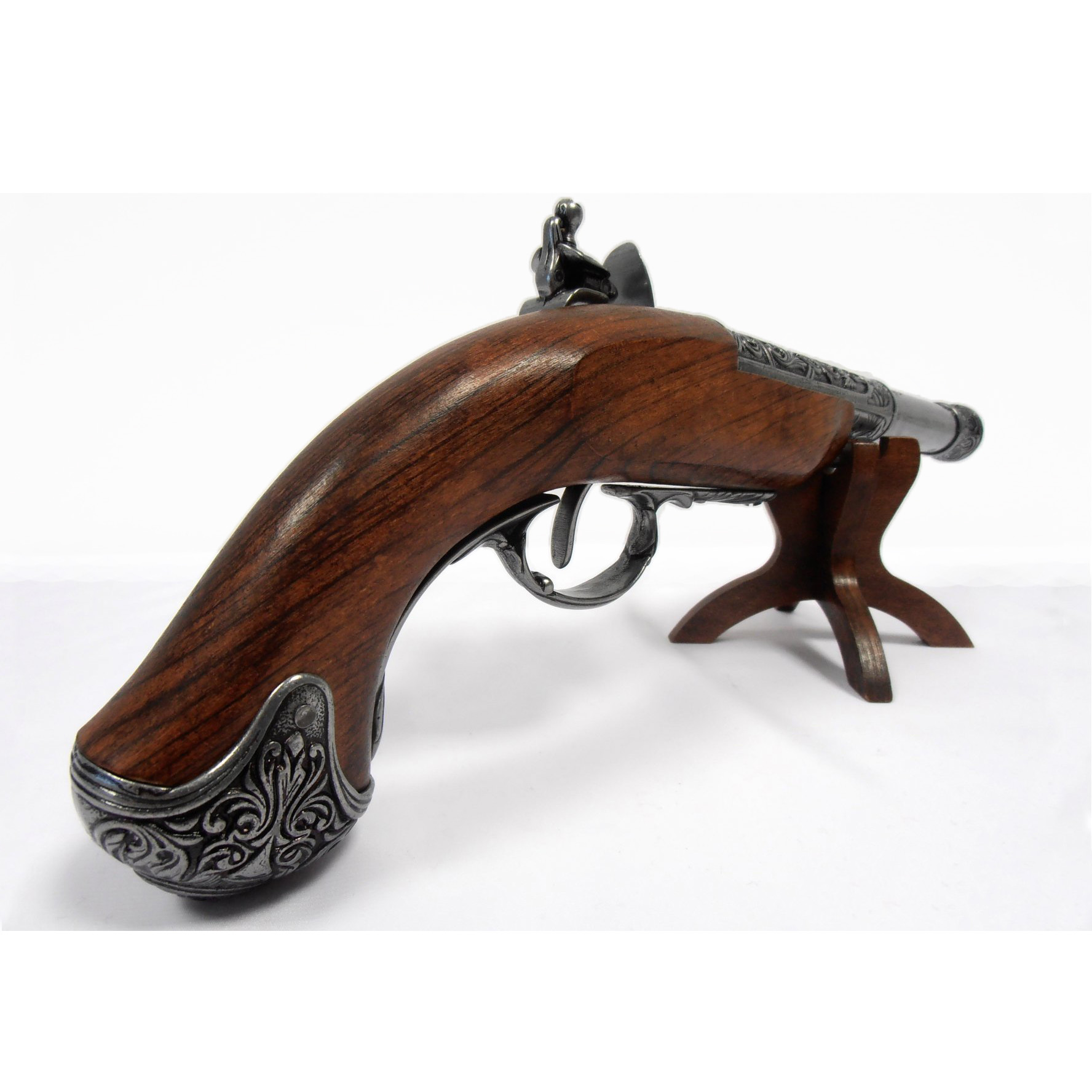 Left-handed flintlock pistol made of wood and metal, India, 18th century