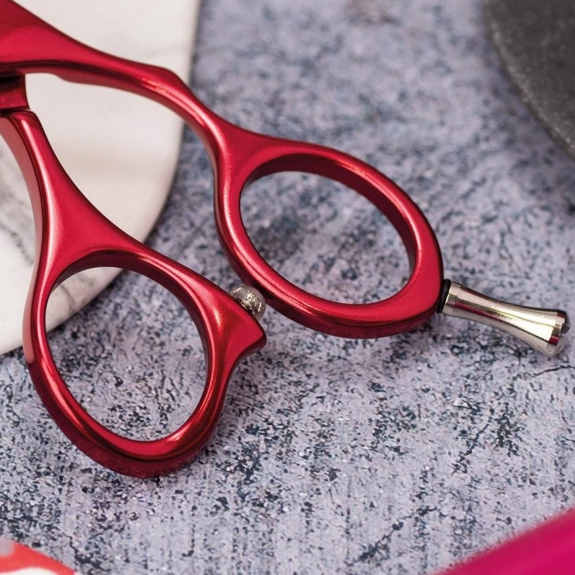 Tijera peluquero Duraluminium rosa 6.5" con filo suave 3 Claveles