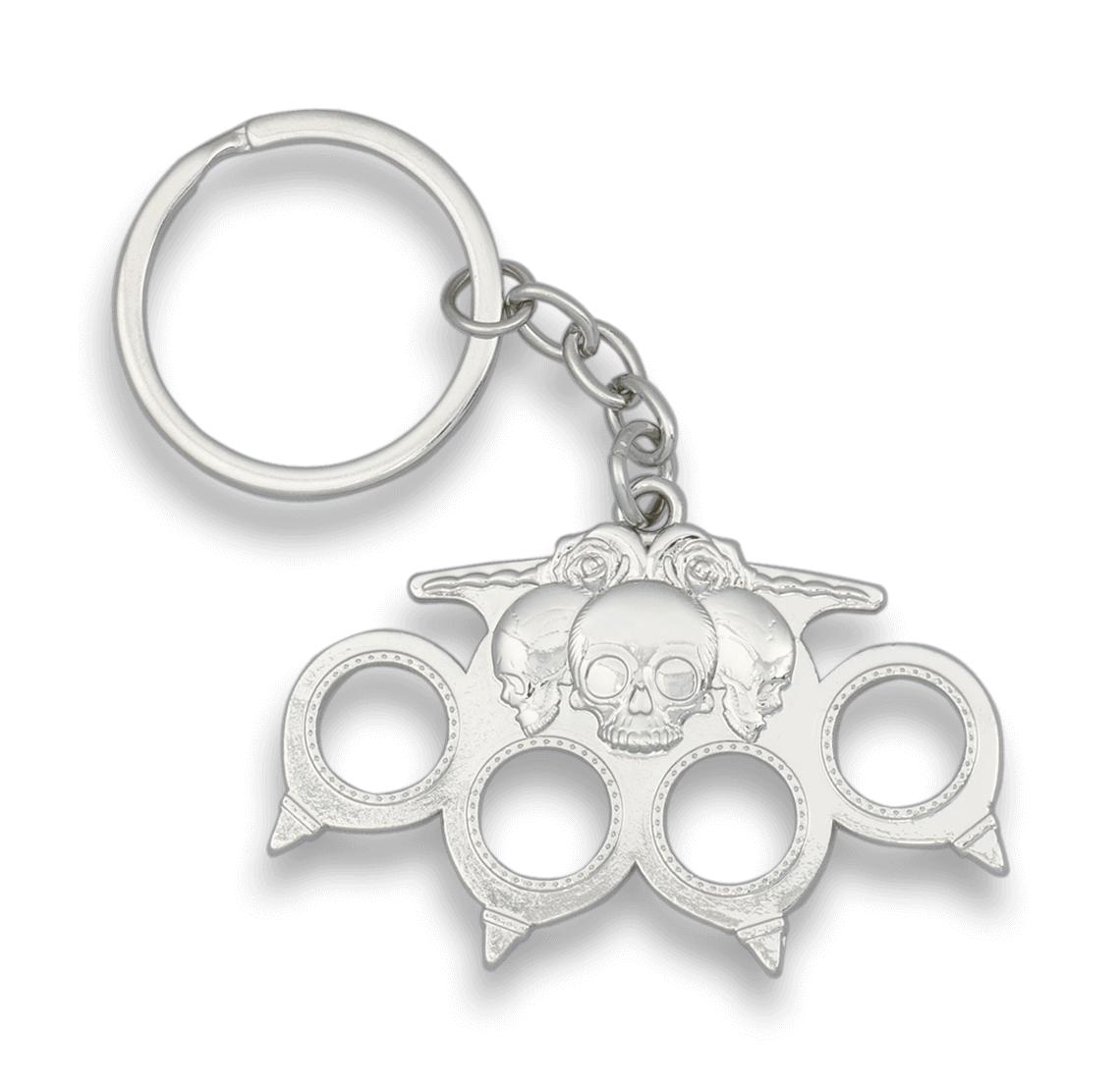Llavero con forma de puño americano con calaveras