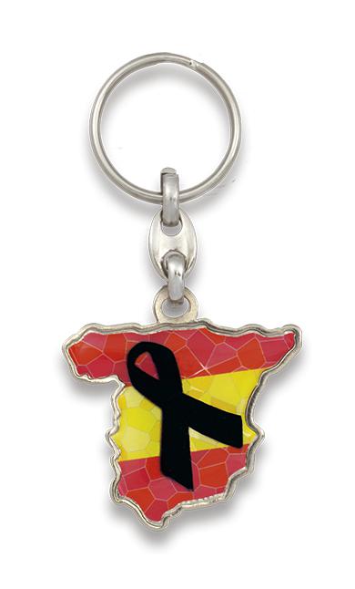 Llavero con lazo negro y mapa de España en el fondo