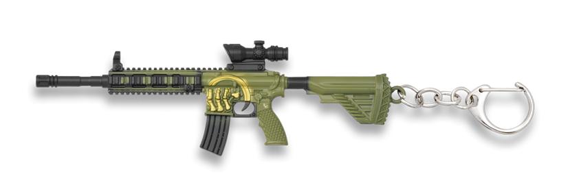Llavero de arma de fuego de color verde y negro de zamak
