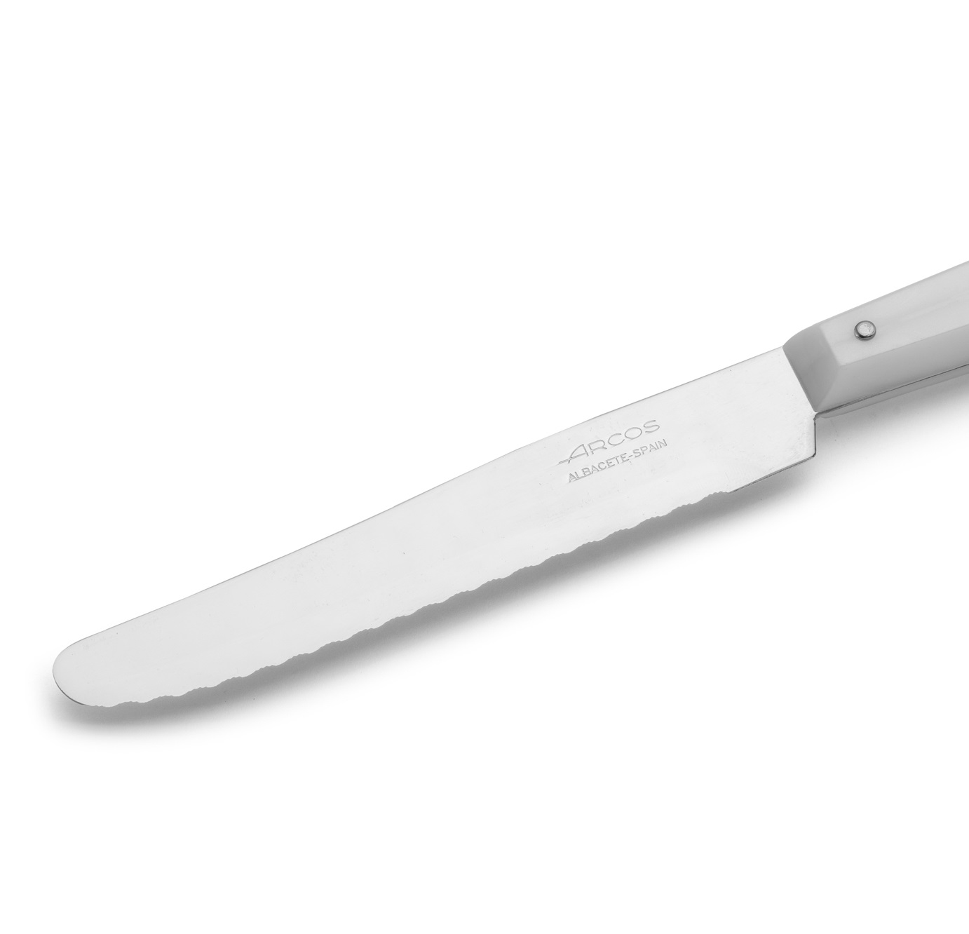 12 cuchillos de mesa Arcos 216 mm con mango de poliamida blanco y hoja de 11.5 cm