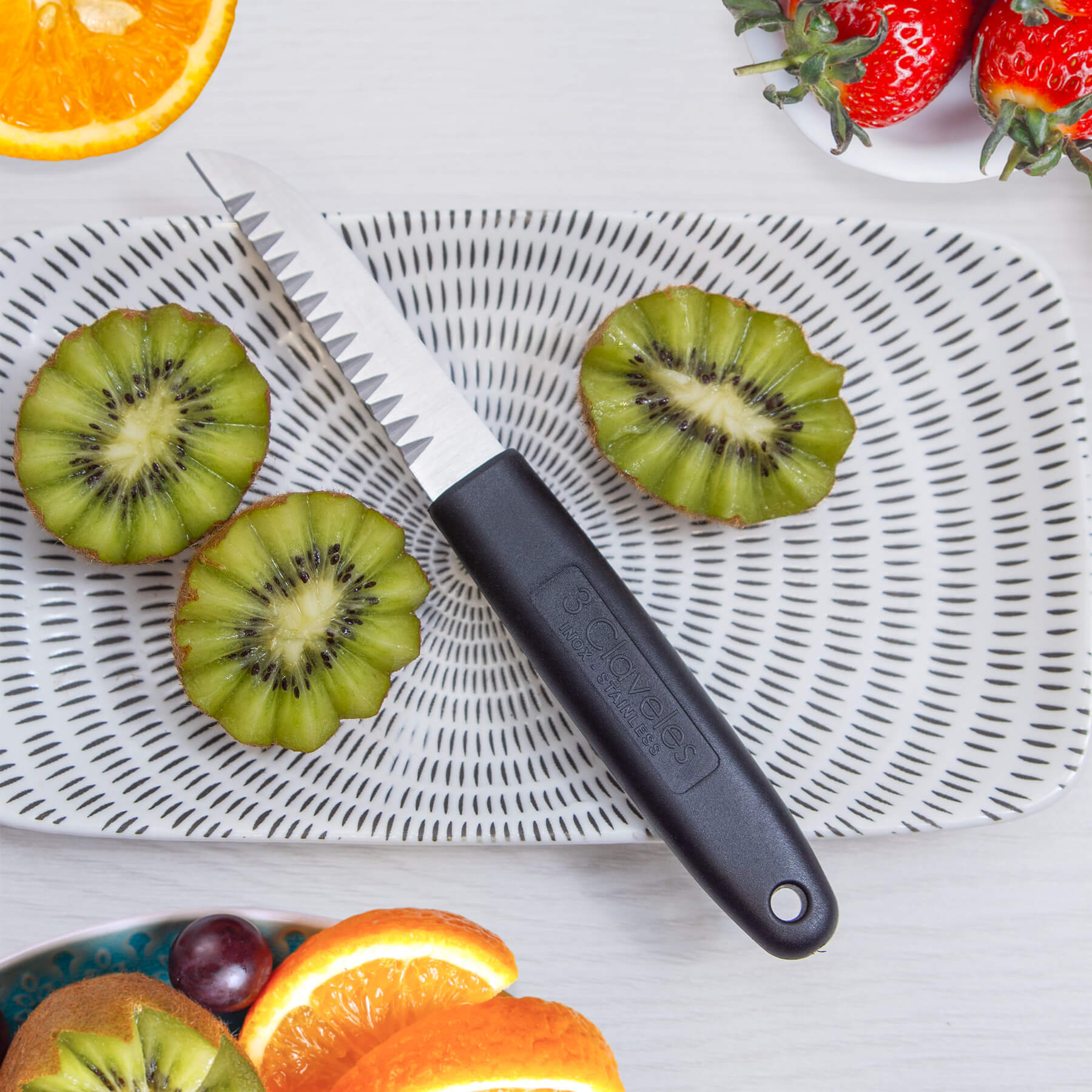 Cuchillo para decorar con mango de polipropileno negro 19.5 cm 3 Claveles