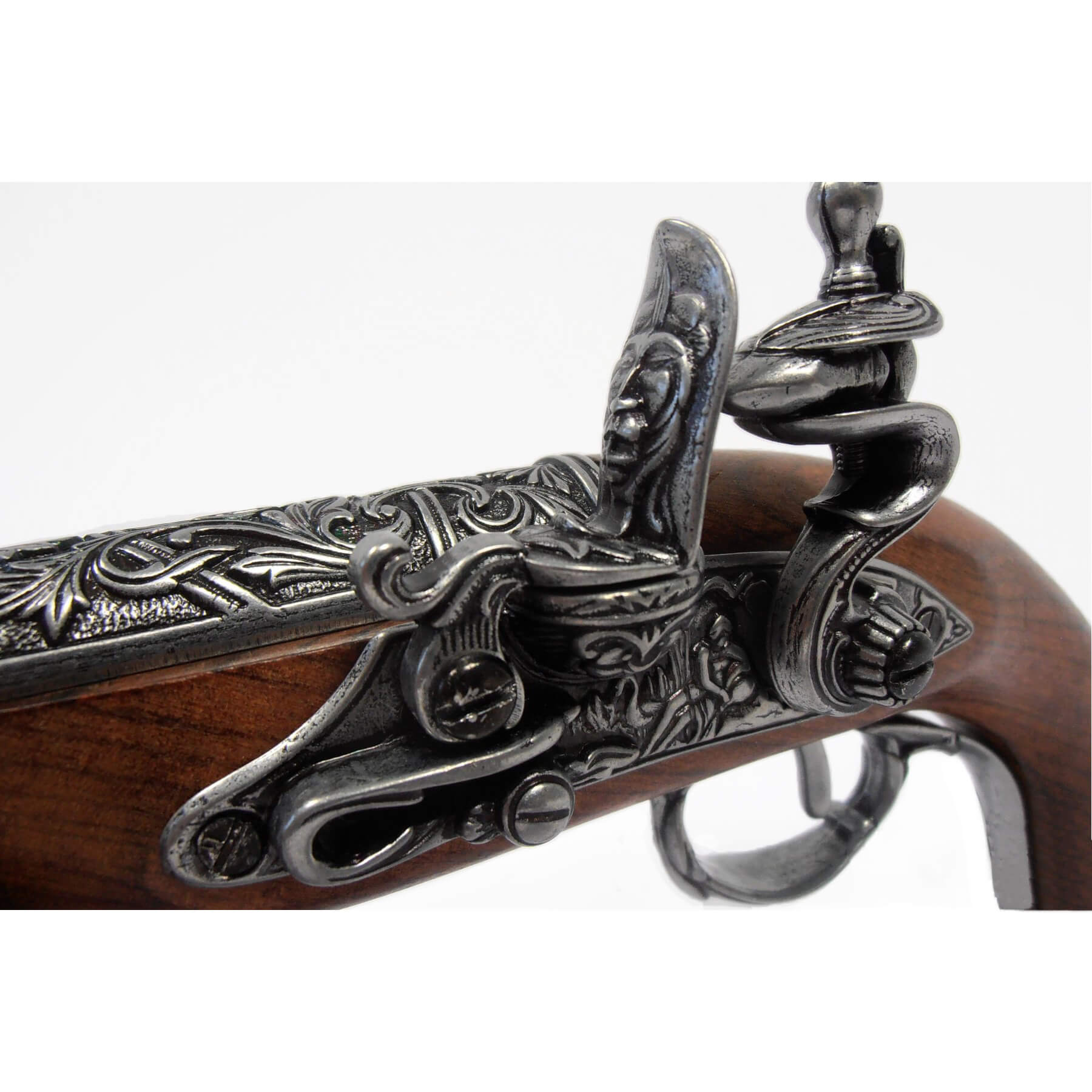 Pistola de pederneira para canhotos feita de madeira e metal, Índia, século XVIII